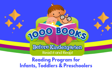 1000 Books Before Kindergarten. Read it and Reap! A smiling family sitting in a big green armchair. The parent reads a book to a toddler and an older child. The toddler has a pacifier and the child is wearing glasses.