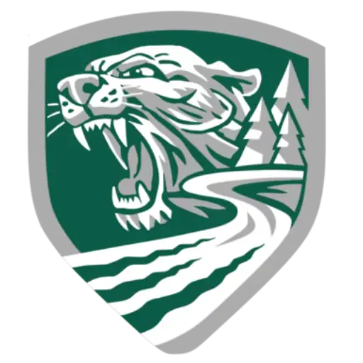 A stylized logo of a roaring wildcat with large fangs, set against a green shield background featuring pine trees and a winding road. The logo is bordered in gray.